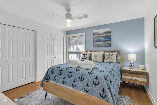 6 Lighthouse Ln Unit 963, Hilton Head Island, SC 29928 - bedroom featuring two closets, wood finished floors, and ceiling fan