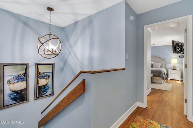 6 Lighthouse Ln Unit 963, Hilton Head Island, SC 29928 - hall featuring wood finished floors and a chandelier