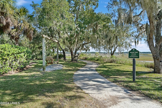 view of home's community featuring a lawn