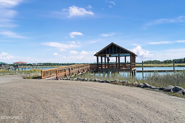 dock area featuring a gazebo and a water view