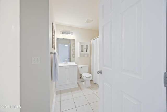 full bathroom featuring visible vents, baseboards, toilet, tile patterned floors, and vanity