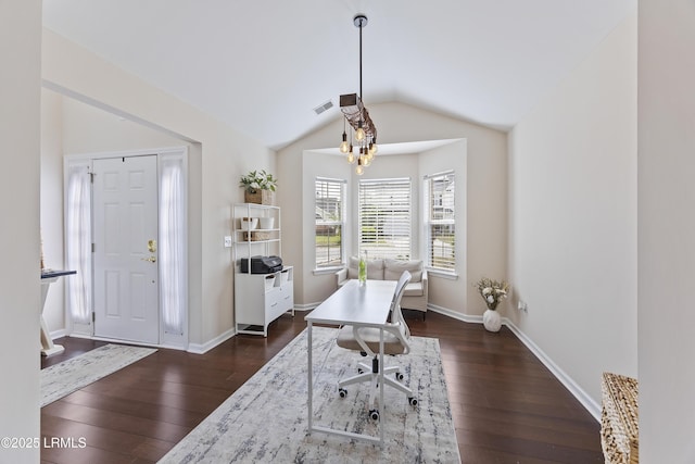 office area featuring lofted ceiling, visible vents, dark wood-style floors, and baseboards