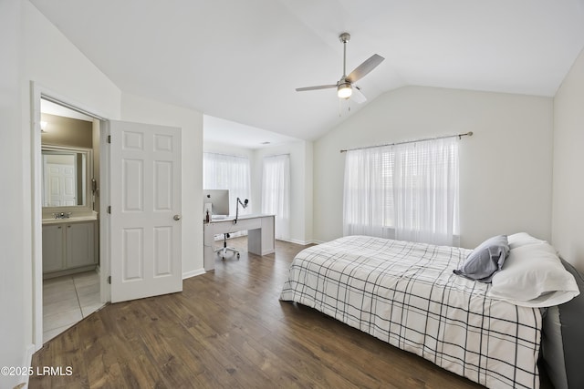 bedroom featuring lofted ceiling, wood finished floors, and ceiling fan