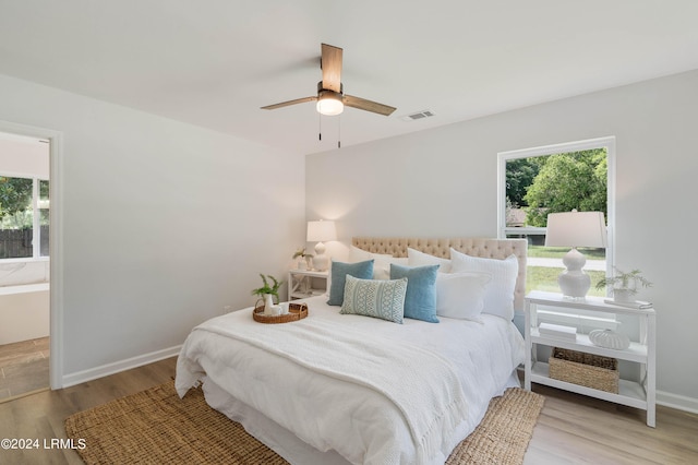 bedroom featuring ceiling fan and light hardwood / wood-style floors