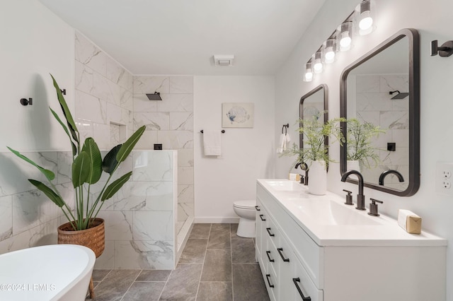 full bathroom with vanity, tile walls, toilet, and separate shower and tub