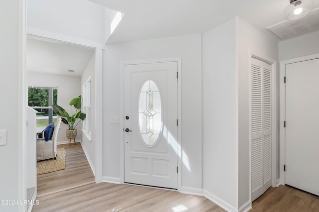 foyer entrance featuring light hardwood / wood-style flooring