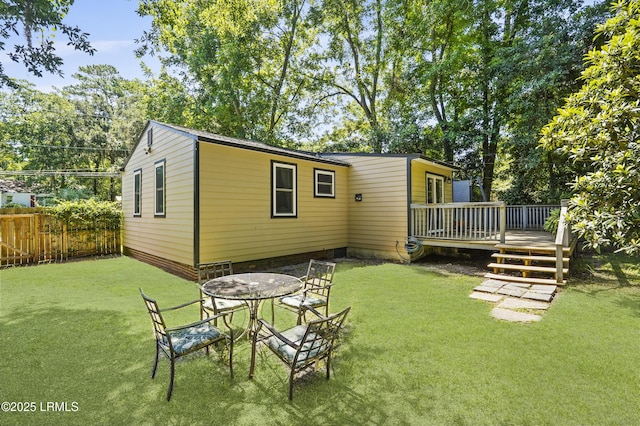 174 James St, Beaufort, SC 29902 - rear view of house with a wooden deck