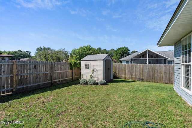 view of yard featuring a shed and an outdoor structure