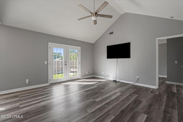 unfurnished living room with a ceiling fan, french doors, dark wood-style flooring, high vaulted ceiling, and baseboards