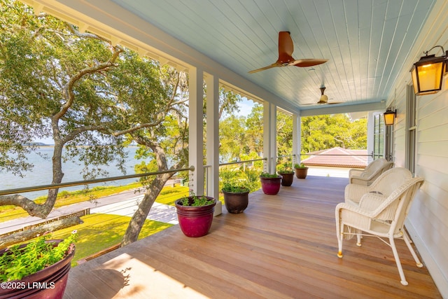 70 Brams Point Rd, Hilton Head Island, SC 29926 - wooden porch featuring a water view and a ceiling fan