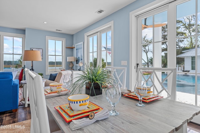 70 Brams Point Rd, Hilton Head Island, SC 29926 - dining room featuring plenty of natural light, wood finished floors, and recessed lighting