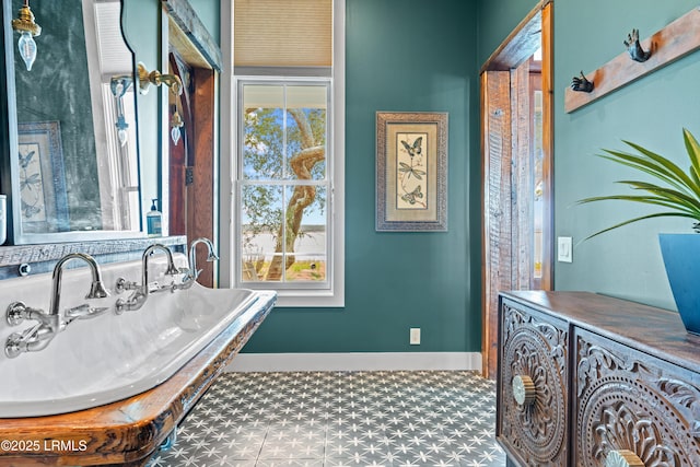 70 Brams Point Rd, Hilton Head Island, SC 29926 - bathroom featuring tile patterned floors and baseboards