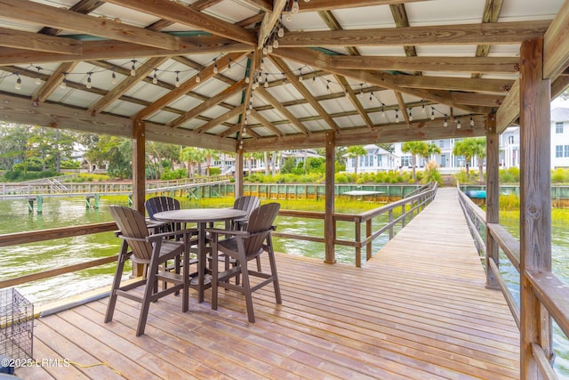 70 Brams Point Rd, Hilton Head Island, SC 29926 - deck with a water view, outdoor dining space, and a gazebo
