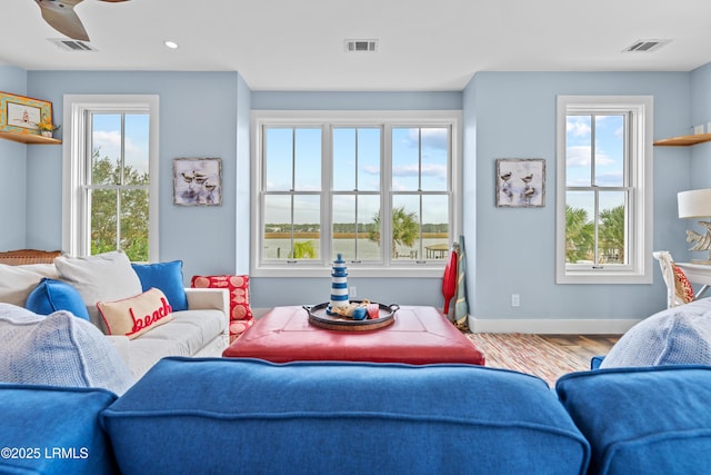 70 Brams Point Rd, Hilton Head Island, SC 29926 - living area featuring baseboards, plenty of natural light, wood finished floors, and recessed lighting