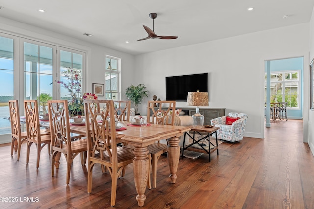70 Brams Point Rd, Hilton Head Island, SC 29926 - dining space with a ceiling fan, healthy amount of natural light, wood-type flooring, recessed lighting, and baseboards