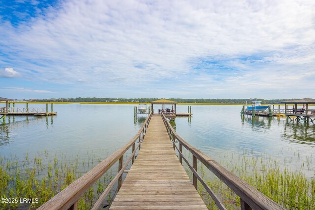 70 Brams Point Rd, Hilton Head Island, SC 29926 - dock area featuring boat lift and a water view