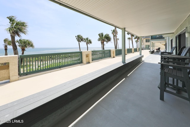 view of patio / terrace with a water view