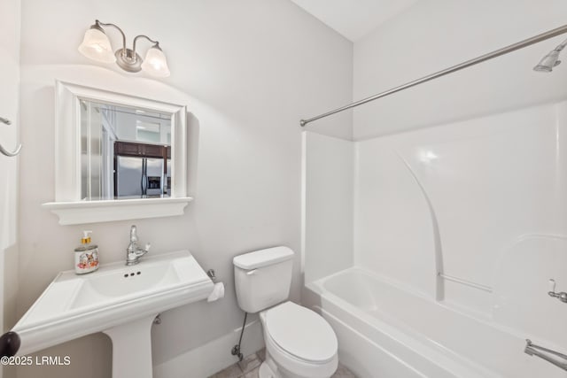 6 Abbey Row Unit 2A, Beaufort, SC 29906 - full bathroom featuring shower / bath combination, toilet, a sink, and baseboards