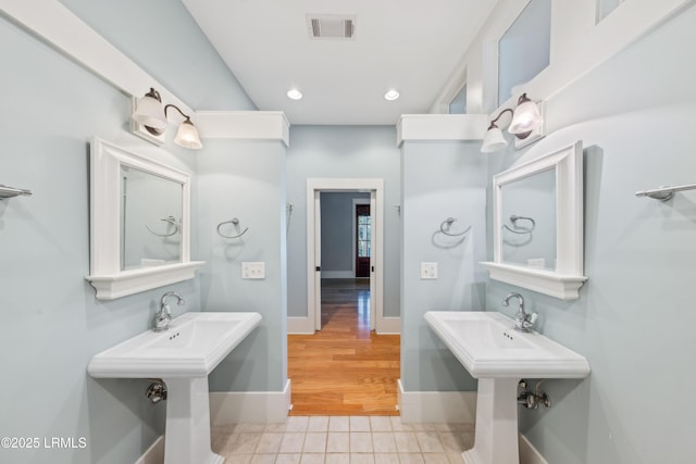 6 Abbey Row Unit 2A, Beaufort, SC 29906 - bathroom featuring baseboards, recessed lighting, and visible vents