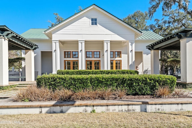 view of front of property with metal roof and a standing seam roof