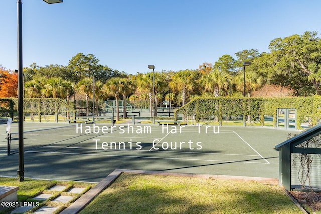 view of sport court featuring playground community