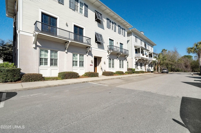 view of building exterior with a residential view