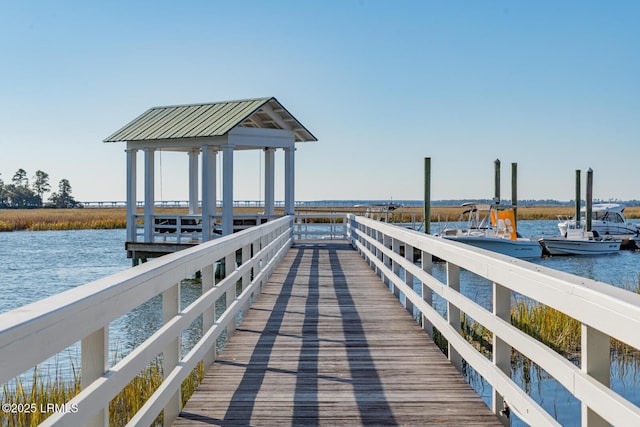 dock area featuring a water view and a gazebo