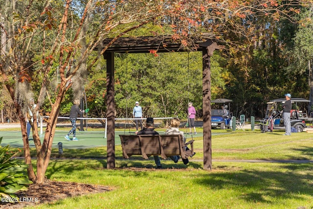 surrounding community featuring a lawn