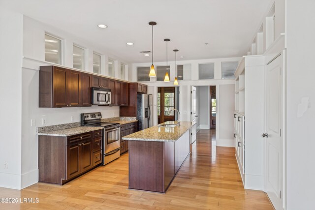 6 Abbey Row Unit 2A, Beaufort, SC 29906 - kitchen featuring light wood-type flooring, recessed lighting, appliances with stainless steel finishes, and a sink