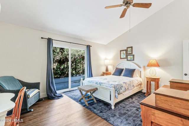 bedroom featuring lofted ceiling, dark wood-type flooring, access to outside, and ceiling fan