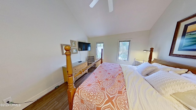 bedroom featuring hardwood / wood-style flooring, ceiling fan, and vaulted ceiling