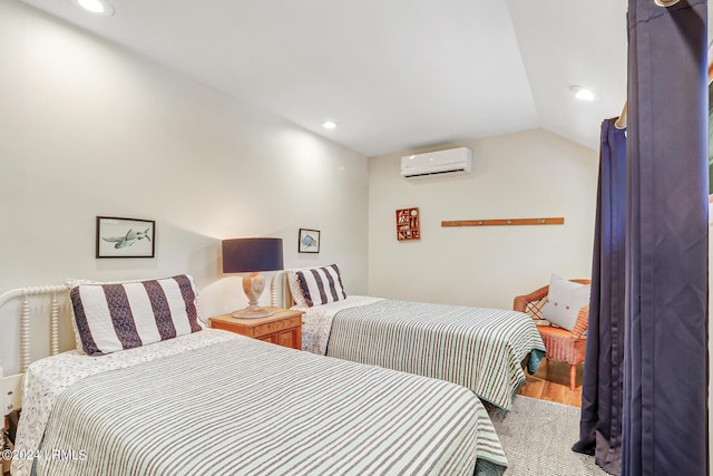 carpeted bedroom featuring lofted ceiling and a wall mounted air conditioner