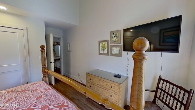 bedroom with wood-type flooring