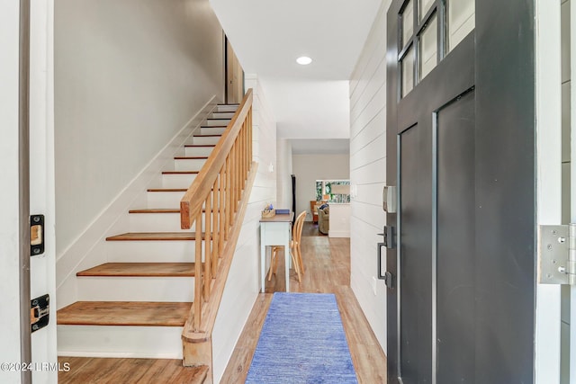 entrance foyer with light hardwood / wood-style floors