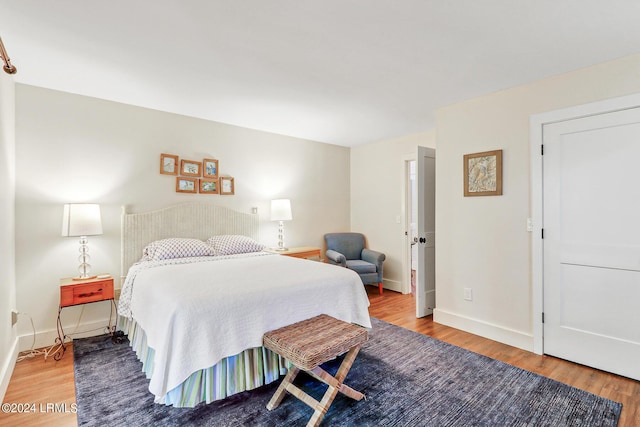 bedroom featuring hardwood / wood-style flooring