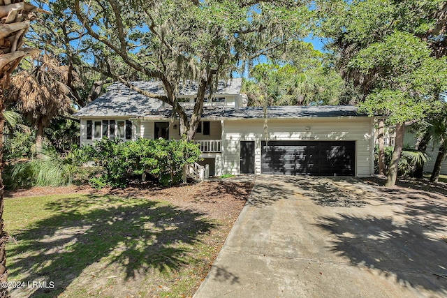 single story home featuring a garage