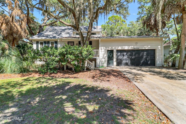 single story home with a garage