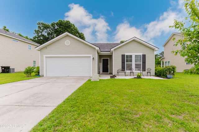173 Okatie Park Cir E, Ridgeland, SC 29936 - ranch-style house with concrete driveway, a garage, and a front yard