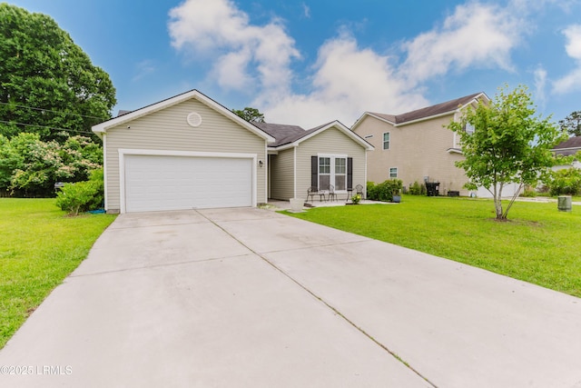 173 Okatie Park Cir E, Ridgeland, SC 29936 - single story home featuring a garage, concrete driveway, and a front lawn