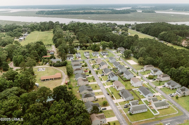 173 Okatie Park Cir E, Ridgeland, SC 29936 - aerial view of property and surrounding area with a nearby body of water, nearby suburban area, and a tree filled landscape