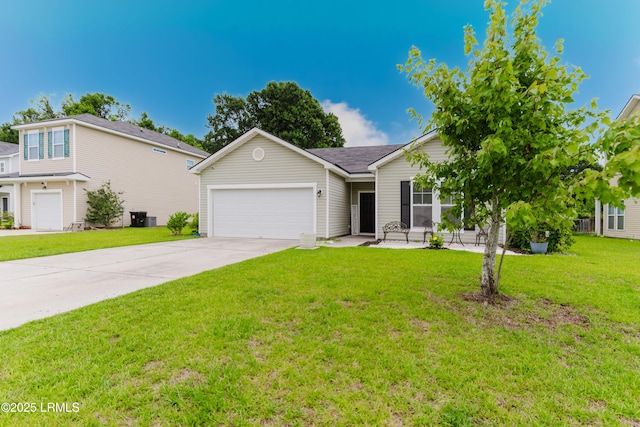 173 Okatie Park Cir E, Ridgeland, SC 29936 - view of front of property with driveway, an attached garage, and a front lawn