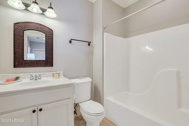 full bathroom featuring bathtub / shower combination, vanity, toilet, and tile patterned flooring