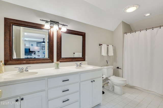 bathroom featuring vaulted ceiling, tile patterned flooring, vanity, toilet, and a shower with shower curtain