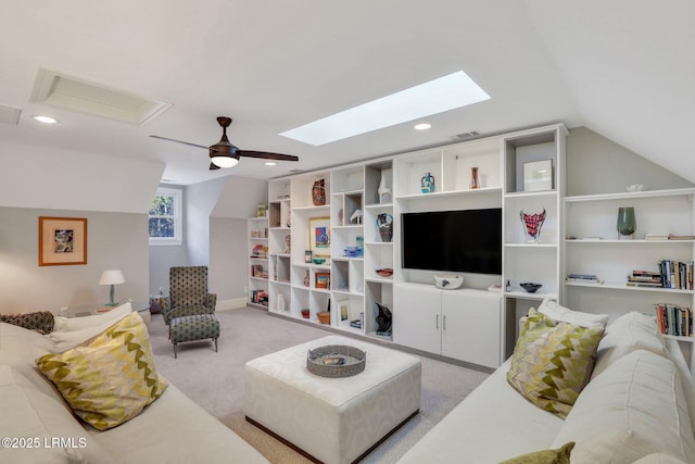 carpeted living room featuring vaulted ceiling