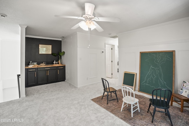 5 Summer Field Ct, Beaufort, SC 29907 - living area featuring ornamental molding, a ceiling fan, and light carpet