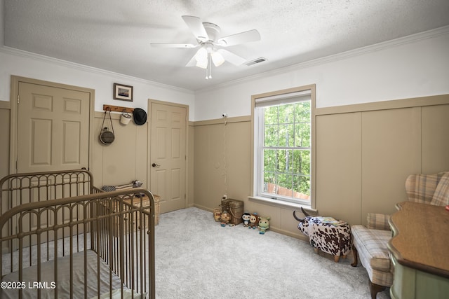 5 Summer Field Ct, Beaufort, SC 29907 - bedroom featuring carpet, crown molding, a textured ceiling, multiple closets, and a ceiling fan