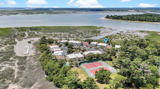 bird's eye view with a water view