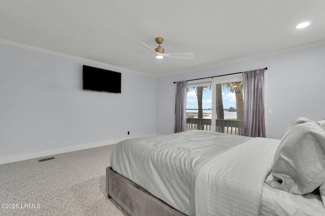 carpeted bedroom featuring visible vents, baseboards, ceiling fan, ornamental molding, and recessed lighting