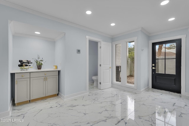 interior space featuring toilet, recessed lighting, baseboards, marble finish floor, and ornamental molding