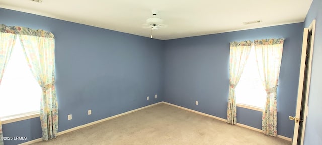 15 Grackle Ln, Beaufort, SC 29906 - unfurnished room featuring healthy amount of natural light and carpet flooring